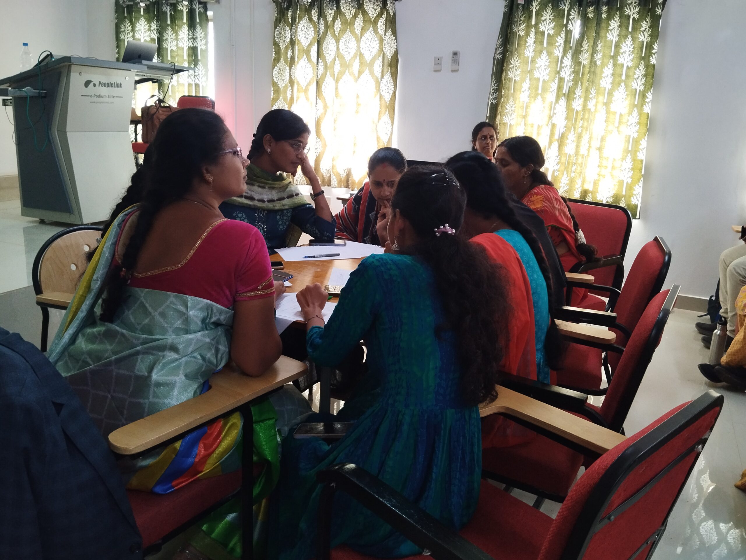 Group-Meeting-in-a-Workshop-on-Skill-Development-scaled.jpg